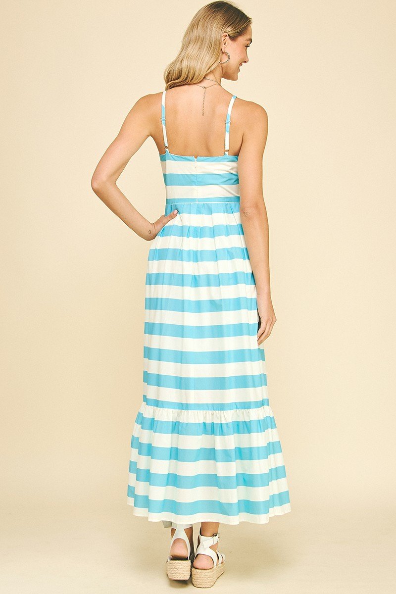 Light blue striped maxi dress for women, perfect for beach outings and tropical vacations, from a coastal boutique.