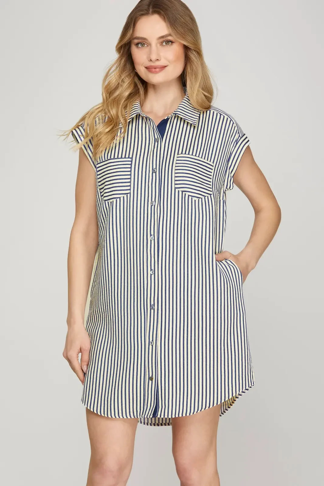 Navy striped mini shirt dress with button-down front, perfect for coastal boutique clothing and casual beach days.