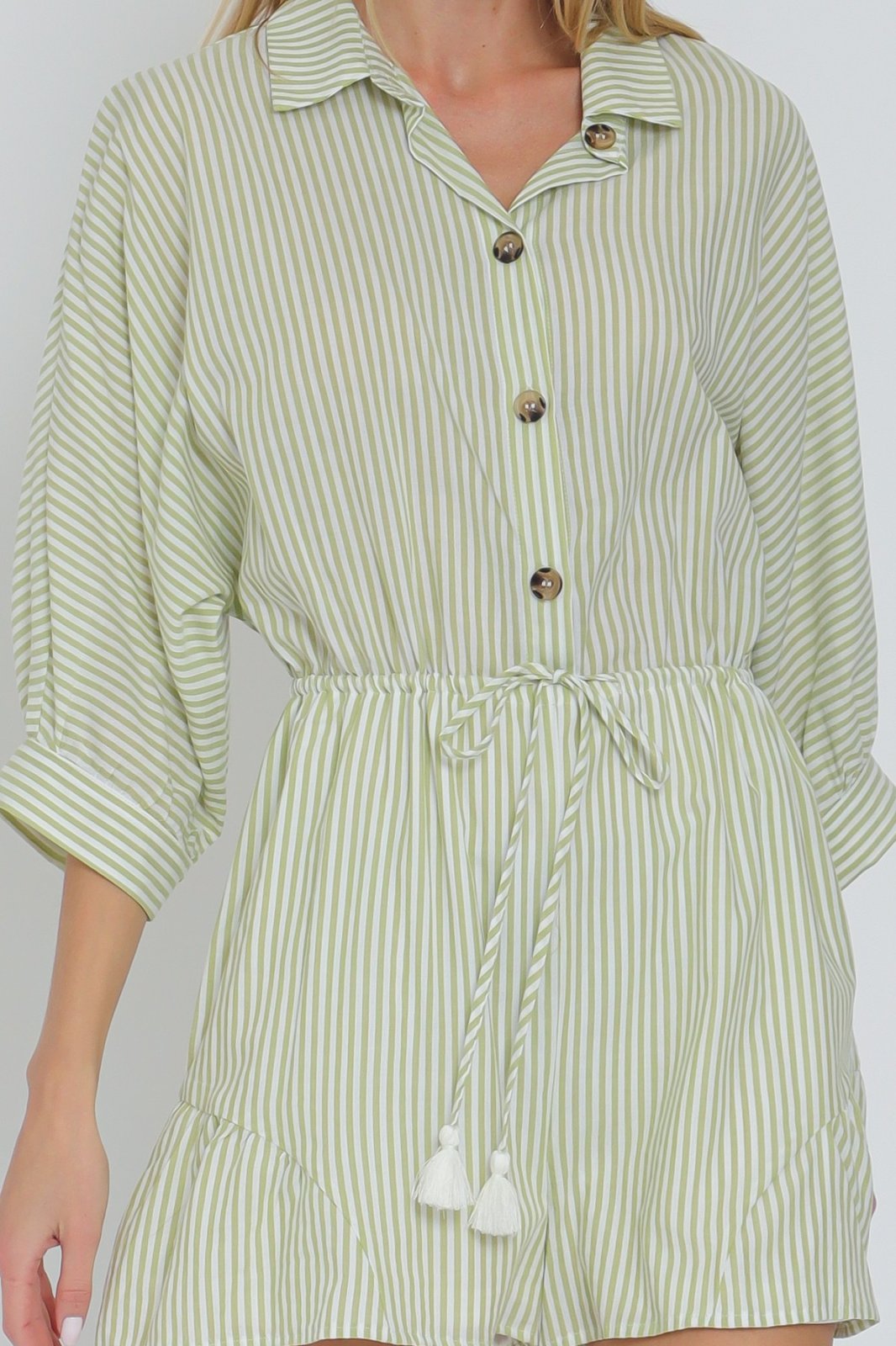 Lime green and white striped romper with 3/4 dolman sleeves and tie-waist for coastal boutique clothing styles.