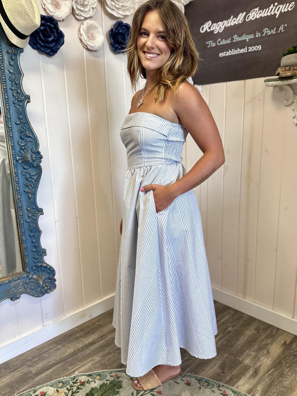 Emerson Dress at Raggdoll Boutique: Chic blue and white tube midi dress. Perfect for beach vacations or brunch dates.