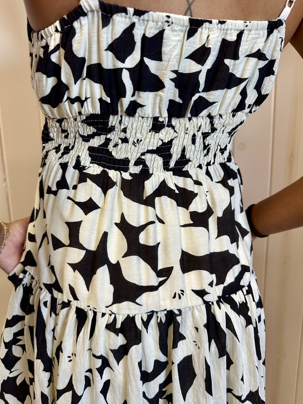 Black and white floral print Louisa dress from coastal boutique clothing, perfect for beach outings and tropical vacations.