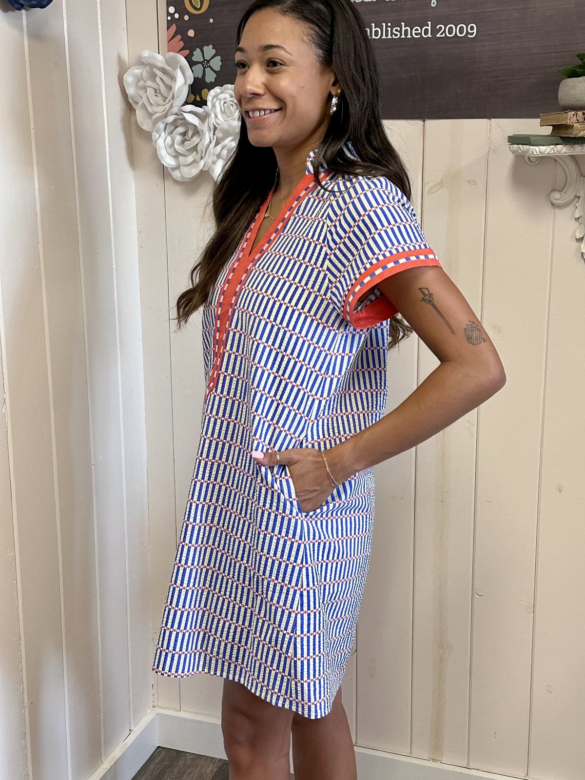 Aubrey Dress from THML in bold orange and blue, perfect for coastal boutique clothing and stylish beach dresses.