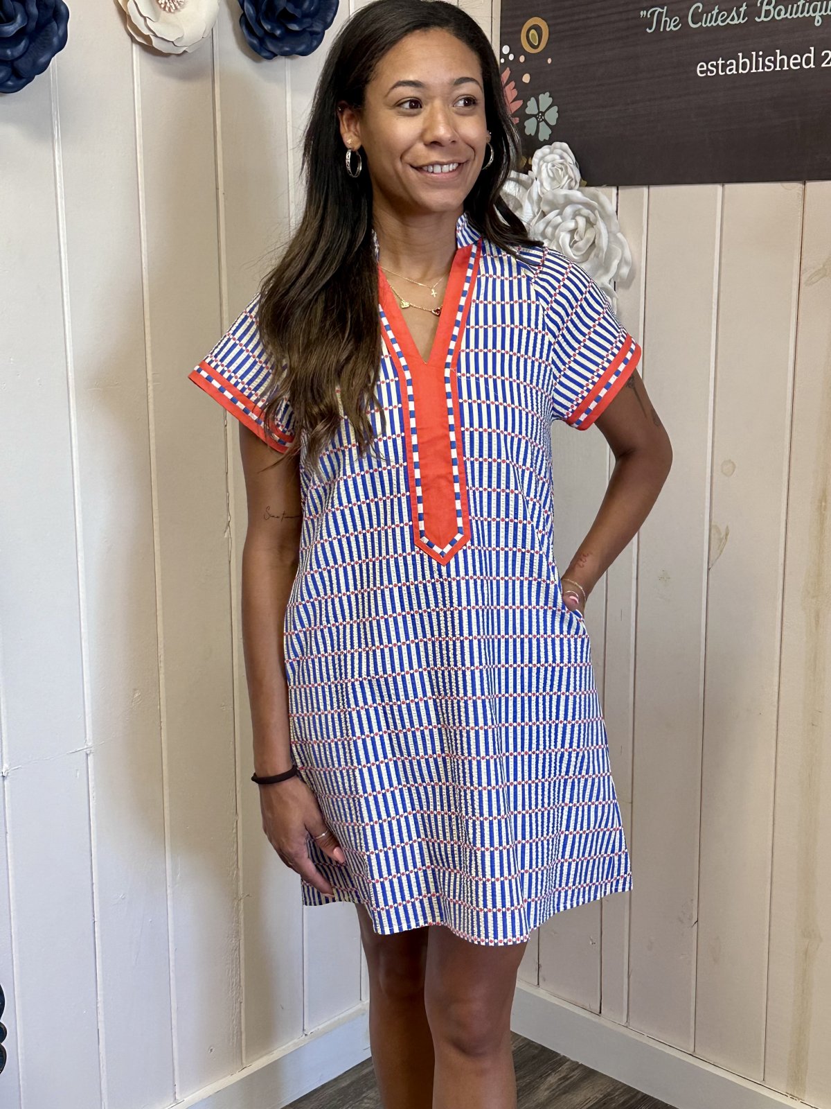 Aubrey Dress from THML in orange and blue, perfect for coastal boutique clothing and tropical vacation dresses.