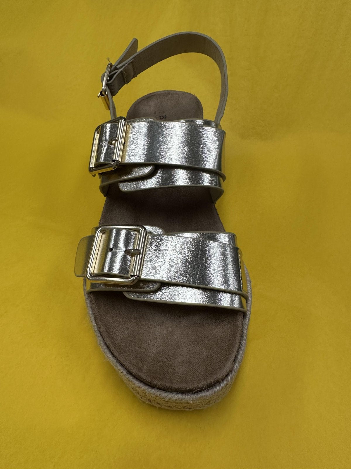 Gold metallic double buckle espadrille sandals with cork sole, perfect for coastal boutique clothing and summer styles.