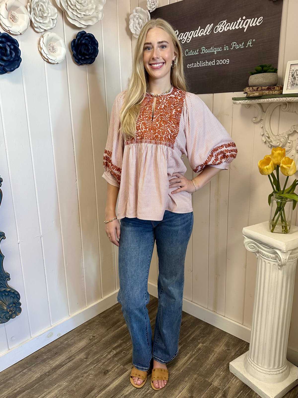 Jessa Top worn by a smiling model at Raggdoll Boutique, showcasing trendy coastal style and summer outfits Texas.