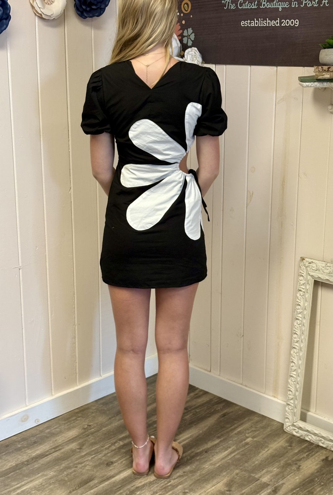 Fleur Dress at coastal boutique, featuring side cutout and puff sleeves, perfect for spring outings and romantic dates.