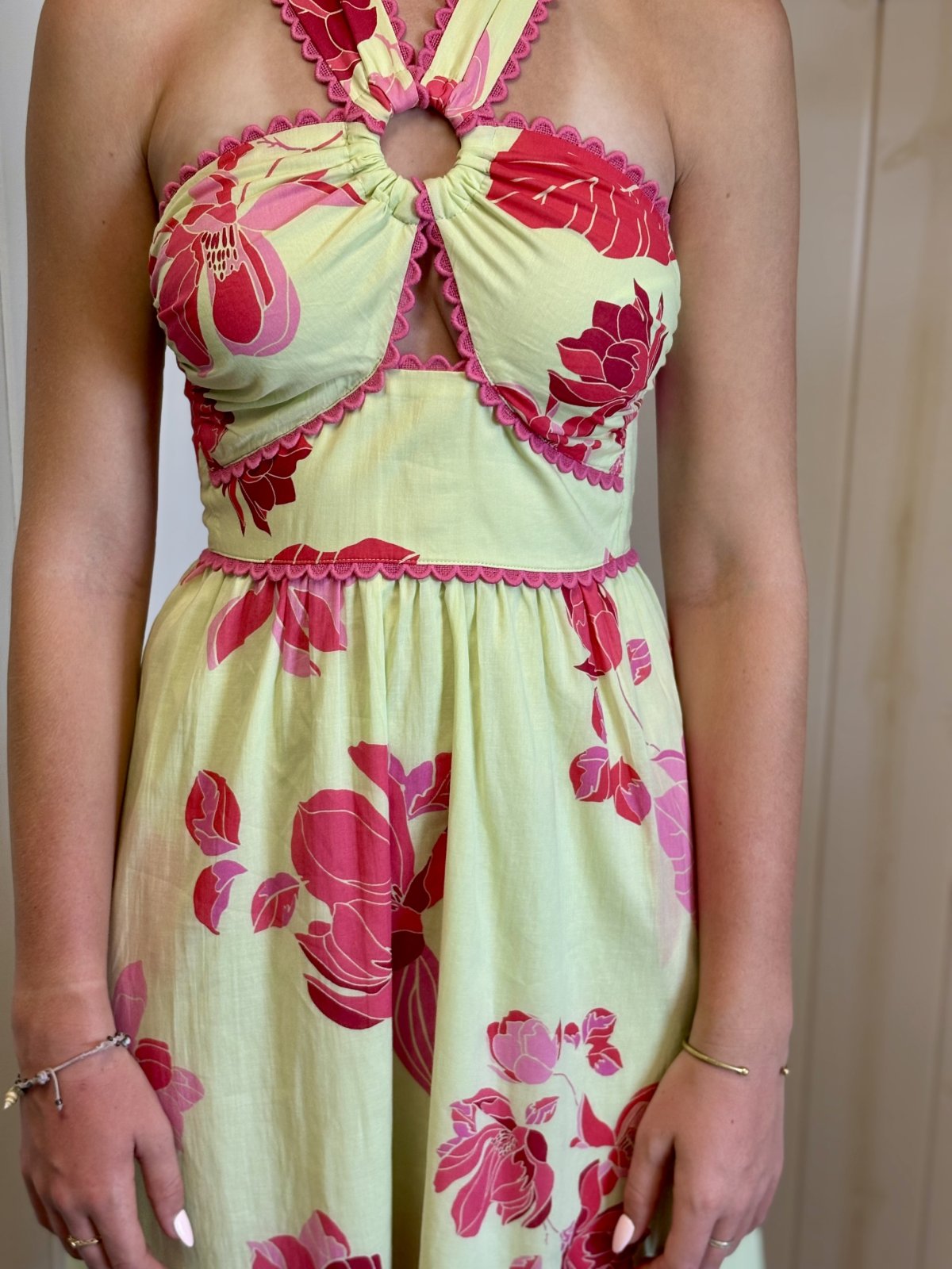 Sloane Dress in floral print, perfect for tropical vacations; ideal for coastal boutique clothing and beach dresses.