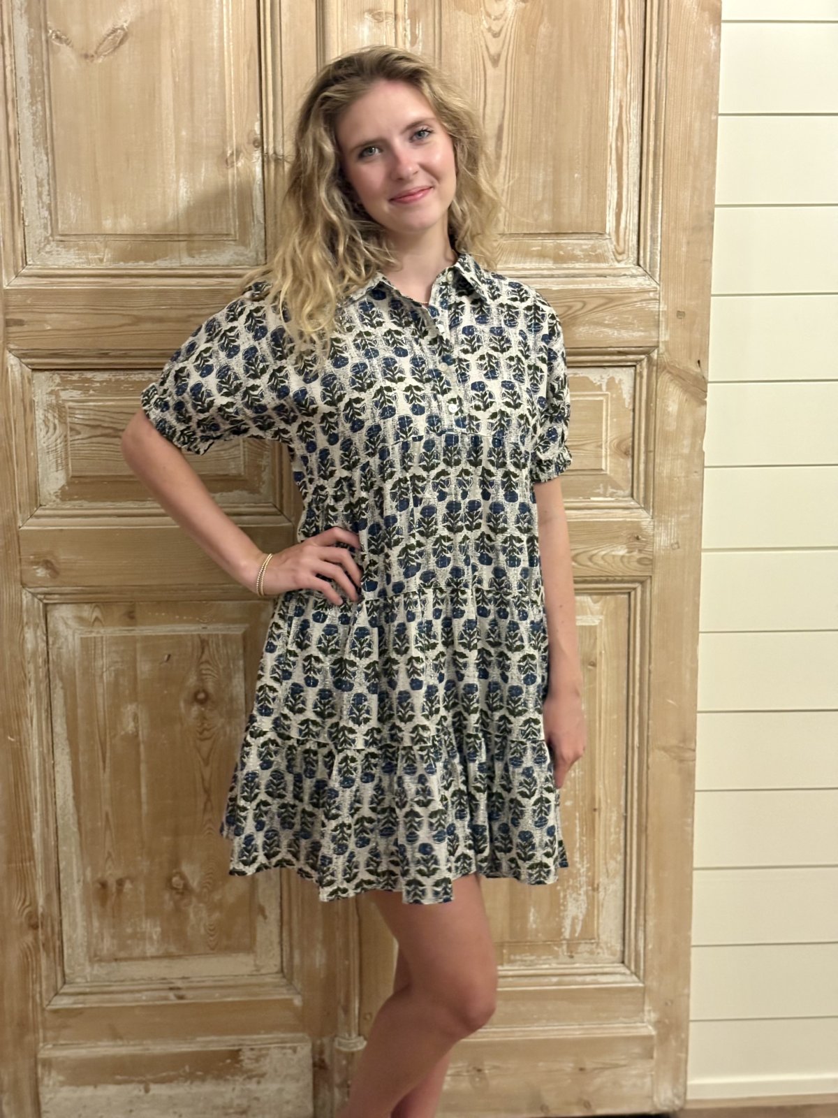 Model wearing the Anna Dress from THML, showcasing a multi-print design, perfect for coastal boutique clothing.