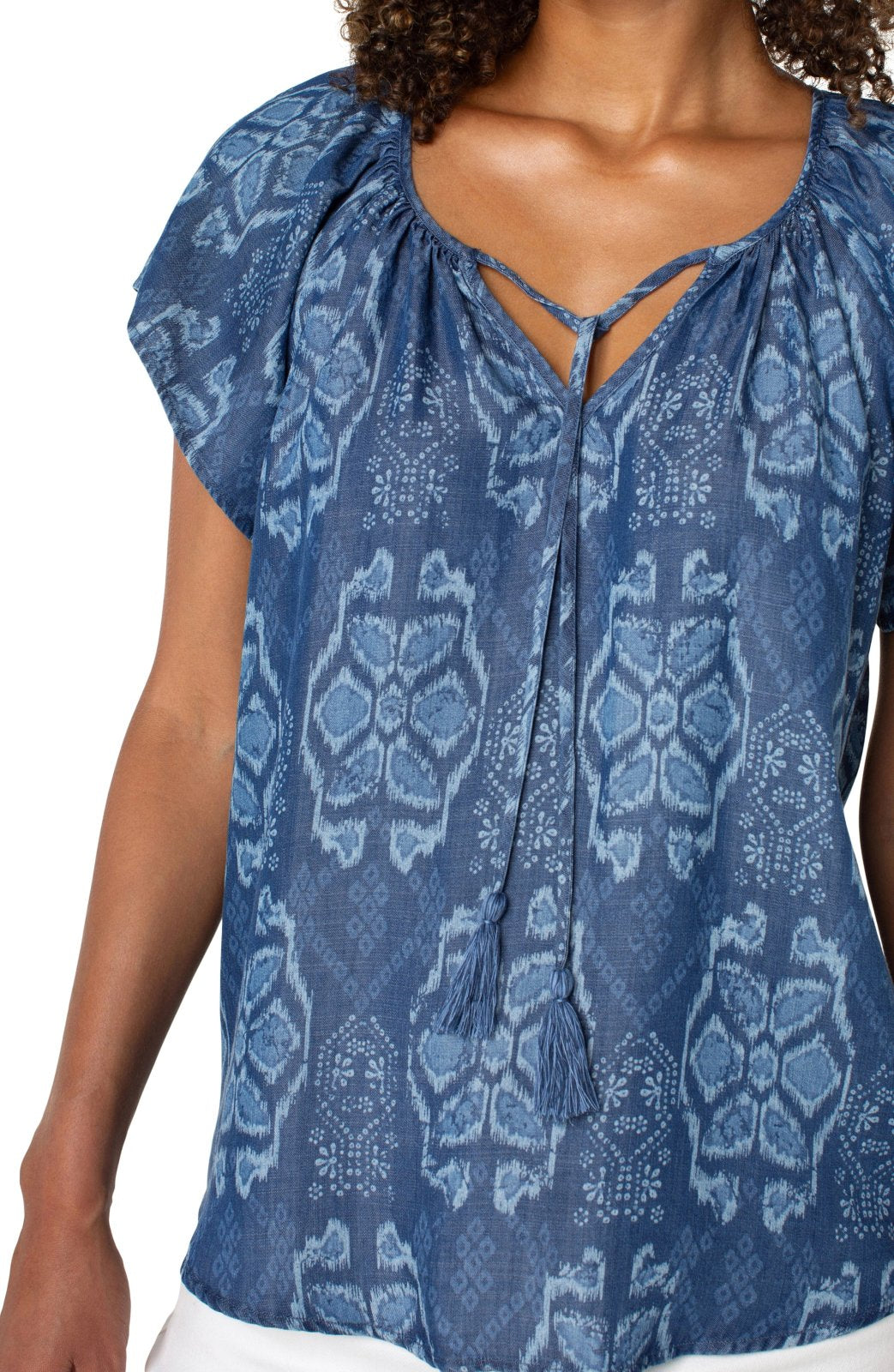 Women’s flutter sleeve top featuring a front tie and exclusive Liverpool print, perfect for coastal boutique clothing.