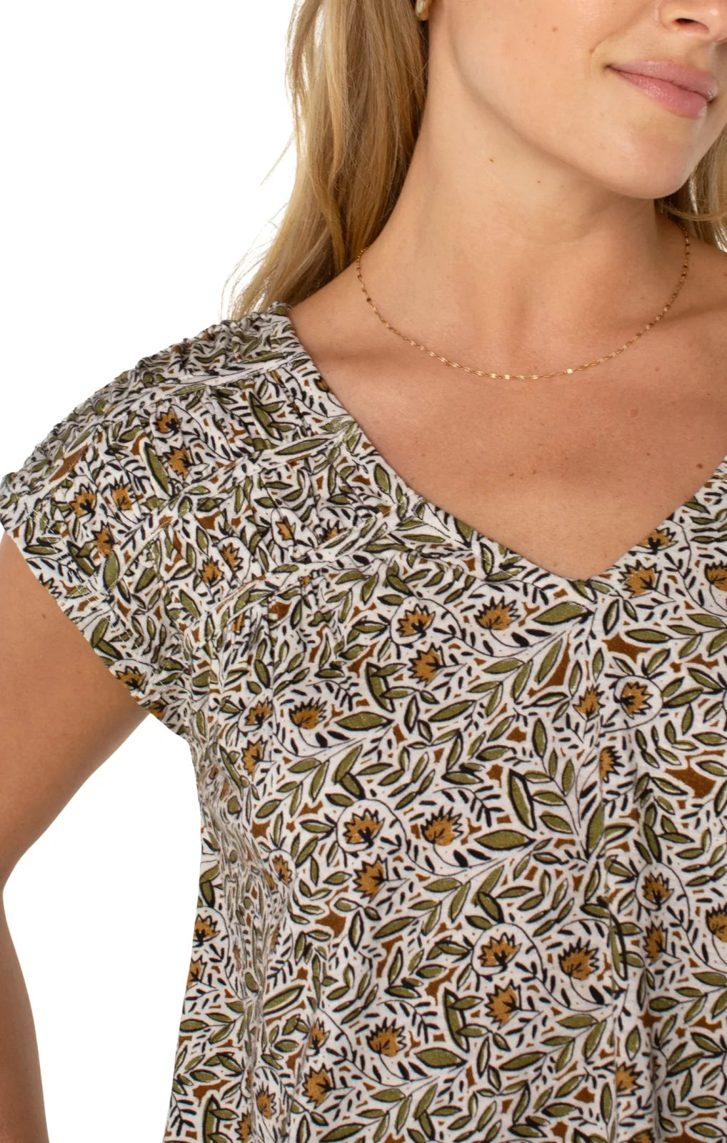 Olive print tie-back top with shirred short sleeves, a stylish addition from a Port Aransas boutique for curated women's fashion.