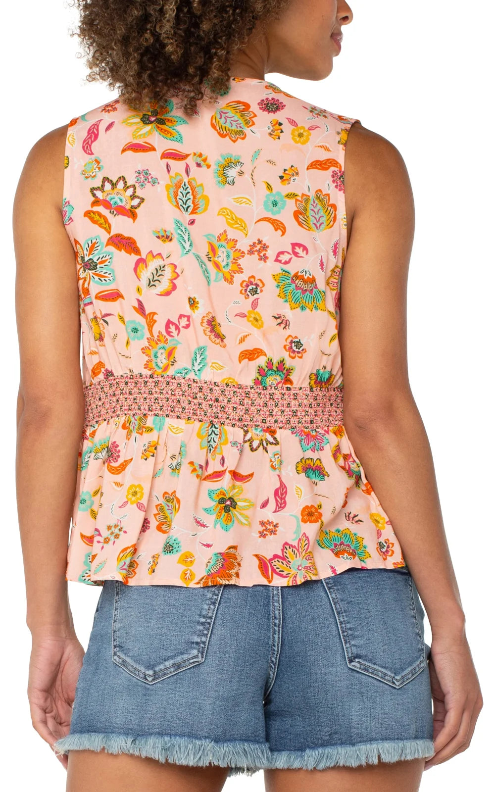 Back view of LP sleeveless floral top with smocked waist, perfect for coastal boutique clothing and tropical vacation dresses.