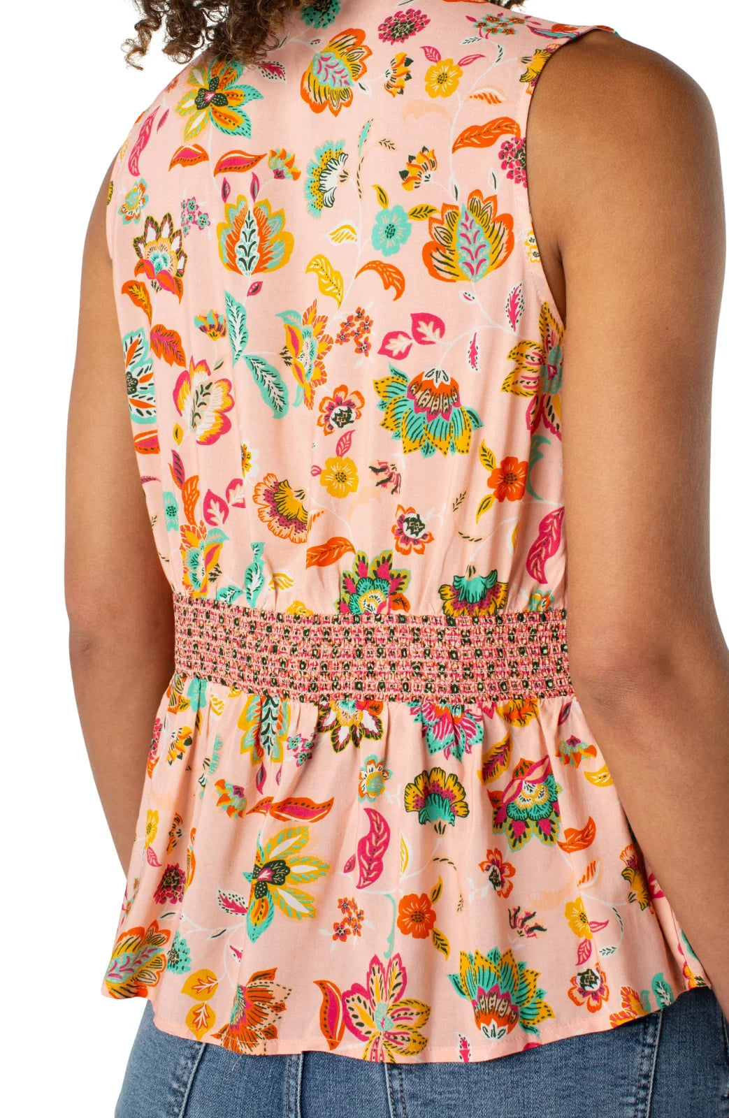 Stylish LP sleeveless top with floral print and smocked waist, perfect for coastal boutique clothing and tropical vacations.