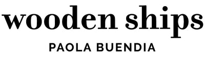 Wooden Ships logo by Paola Buendia, featured in trendy coastal fashion collections.
