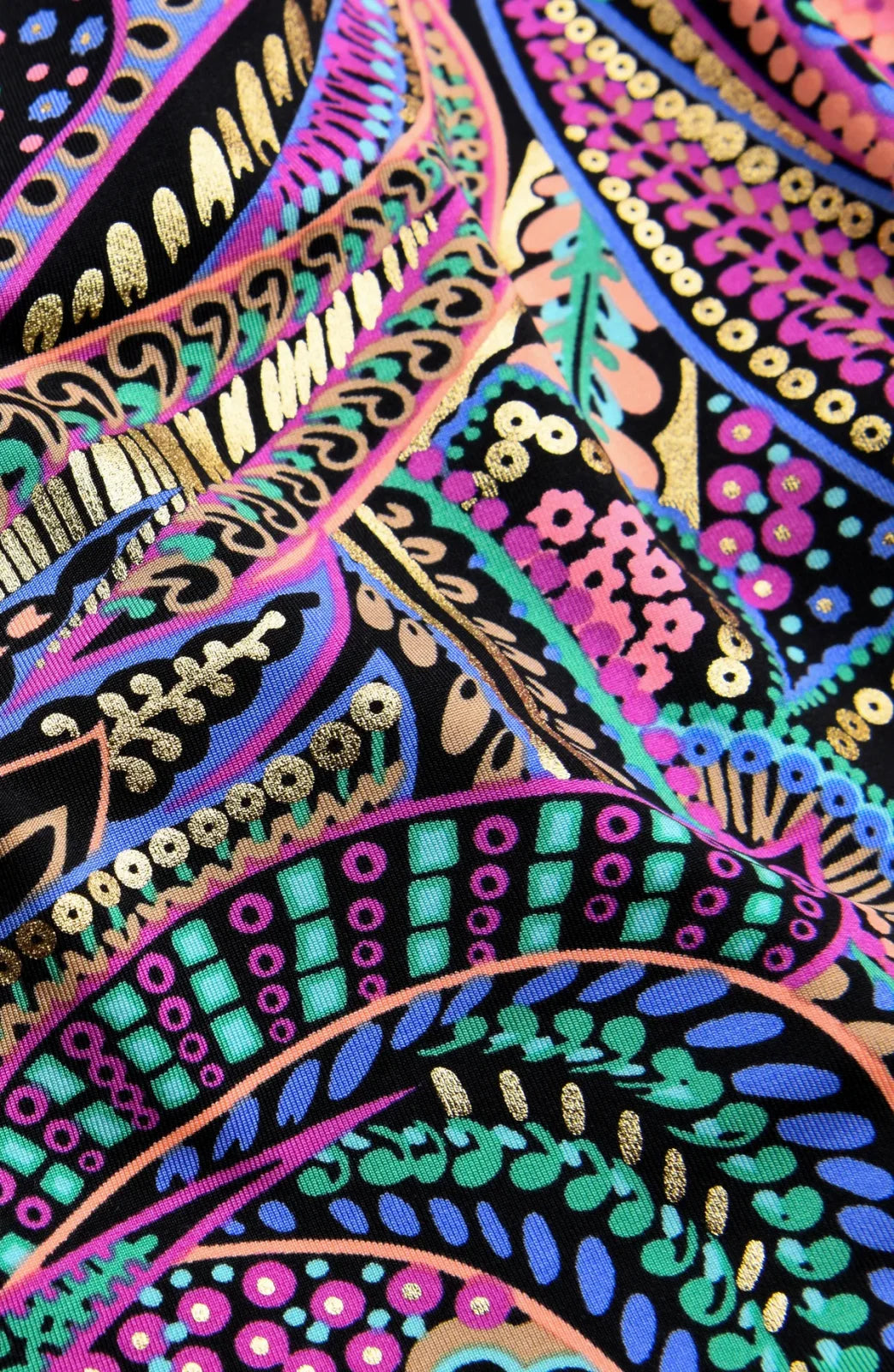 Vibrant multi-colored fabric pattern for Sunshine 79 Disco Dream swimwear, ideal for coastal boutique clothing and tropical vacations.