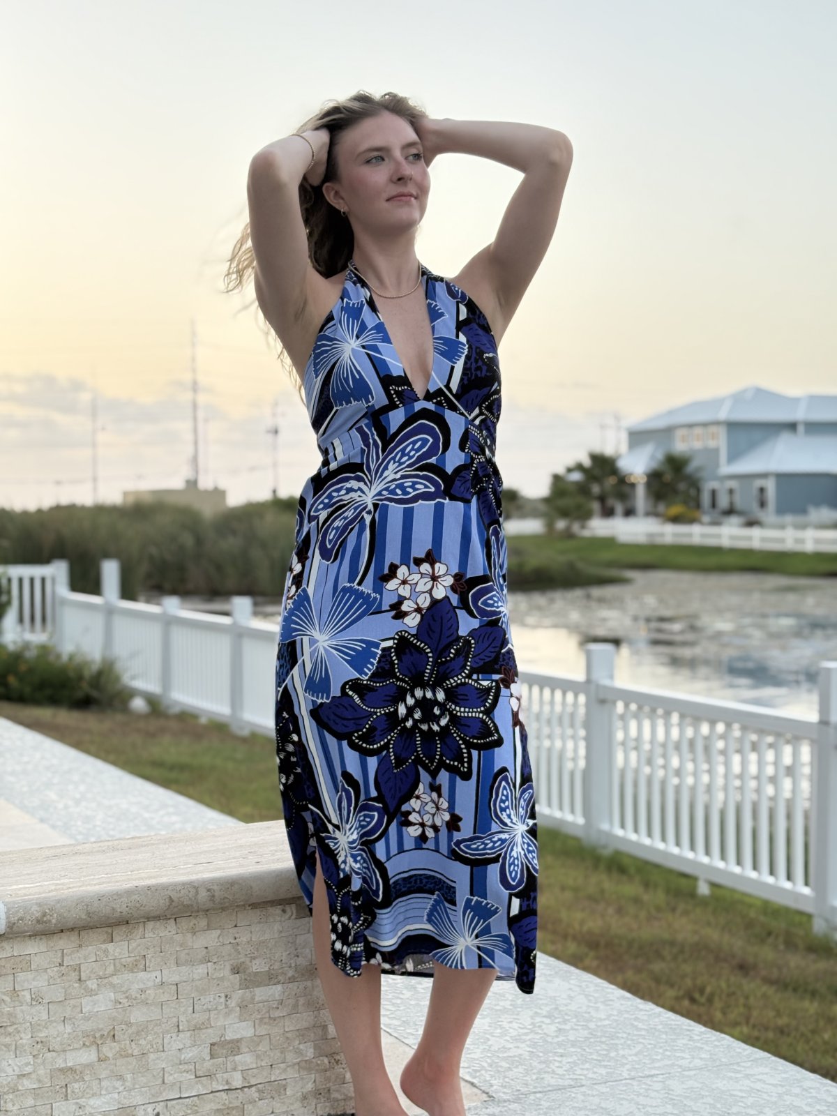 Blue multi halter-style island dress perfect for beach vacations, showcasing tropical elegance from a Port Aransas boutique.