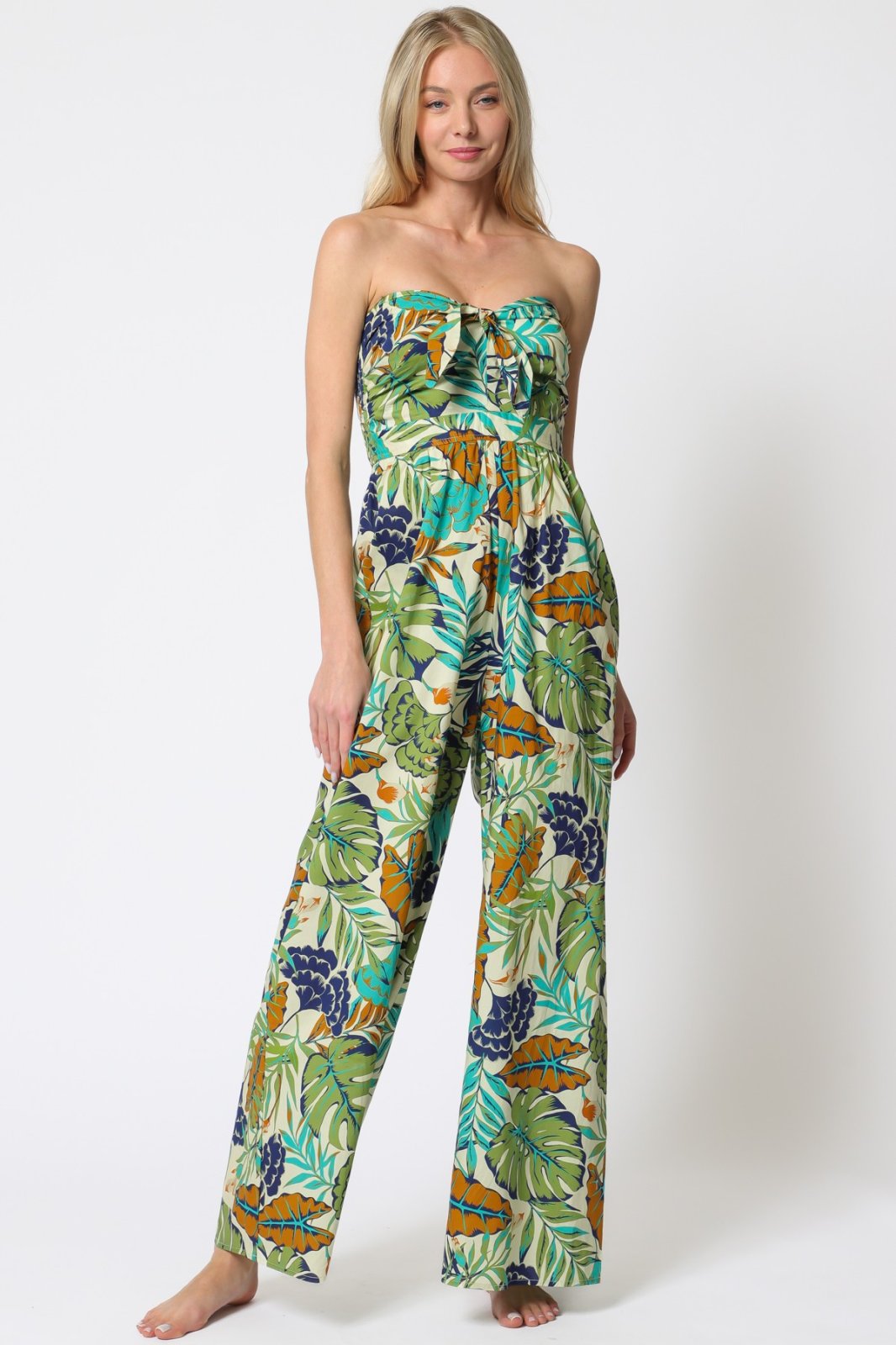 Stylish tropical jumpsuit with a strapless design, perfect for coastal boutique clothing and summer vacations.