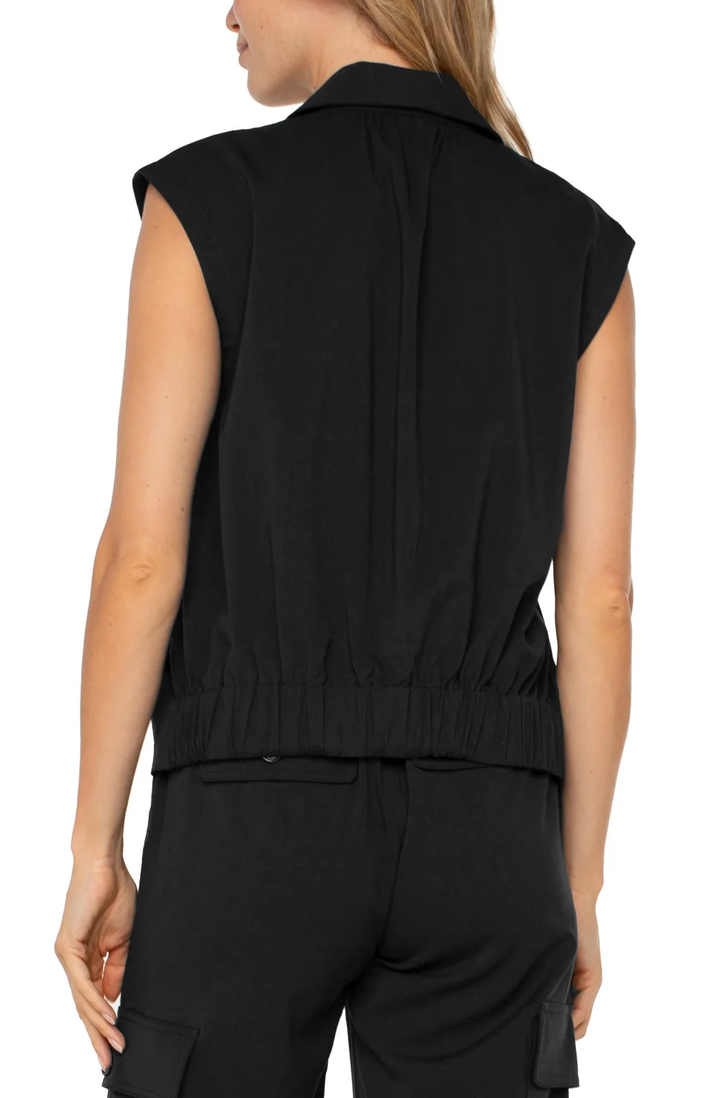 Back view of LP sleeveless cropped shirt in black, highlighting casual style great for coastal boutique clothing and Port Aransas.