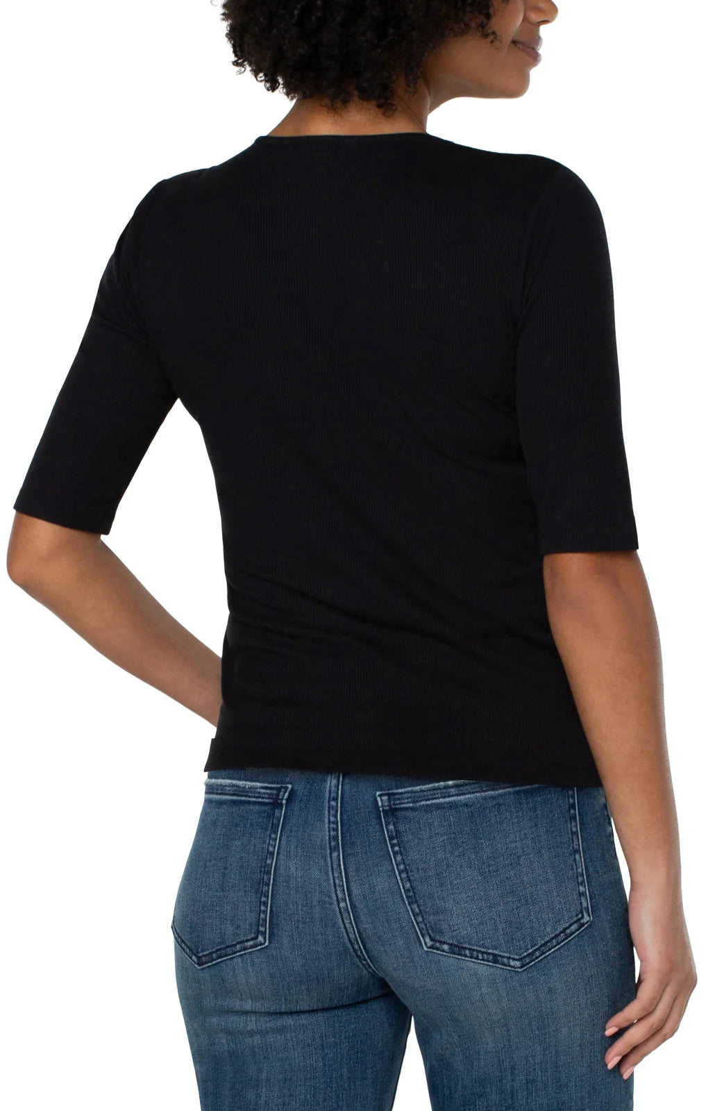 Back view of the Liverpool Double Layer V-neck Rib Knit Top in black, showcasing its stylish elbow-grazing sleeves and flattering fit.