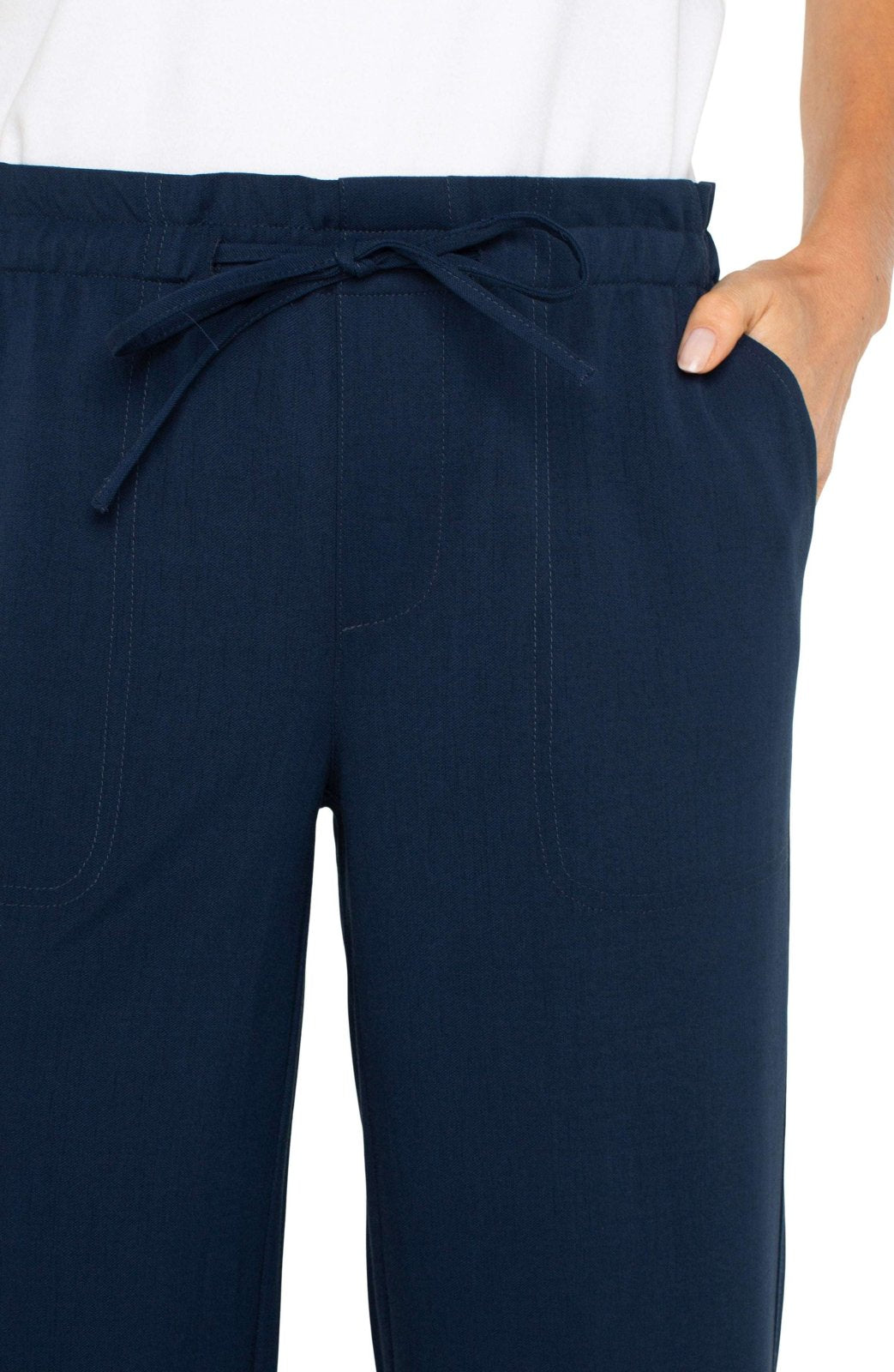 Navy pull-on wide-leg pants with elastic waistband and drawstring, perfect for coastal boutique clothing styles.