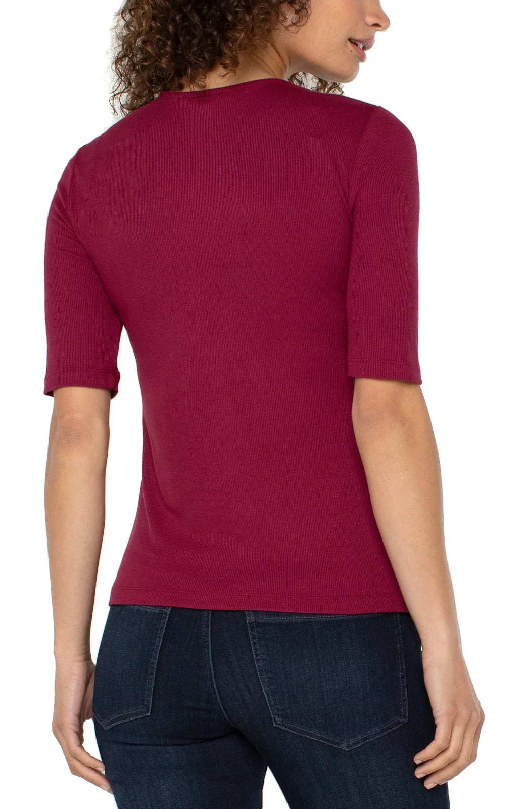 Back view of a cherry double layer V-neck rib knit top for women, ideal for coastal boutique clothing and curated women's fashion.