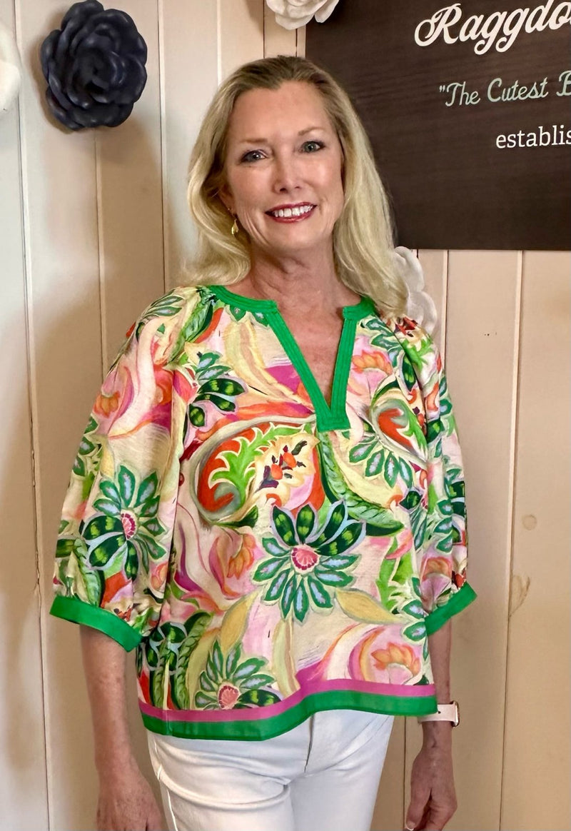 Model wearing v-neck floral top