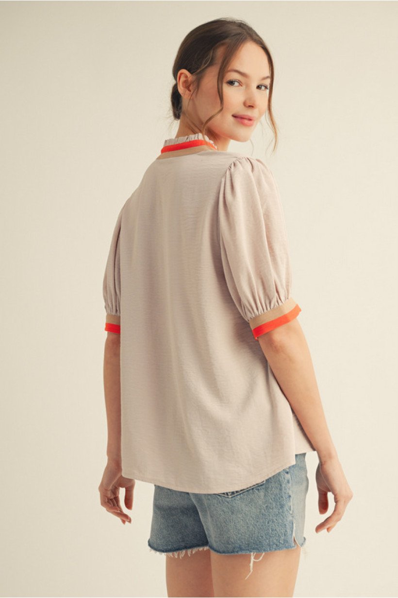 Dani Top: Stylish tan half-sleeve top with orange trim, perfect for coastal boutique clothing and casual outings.