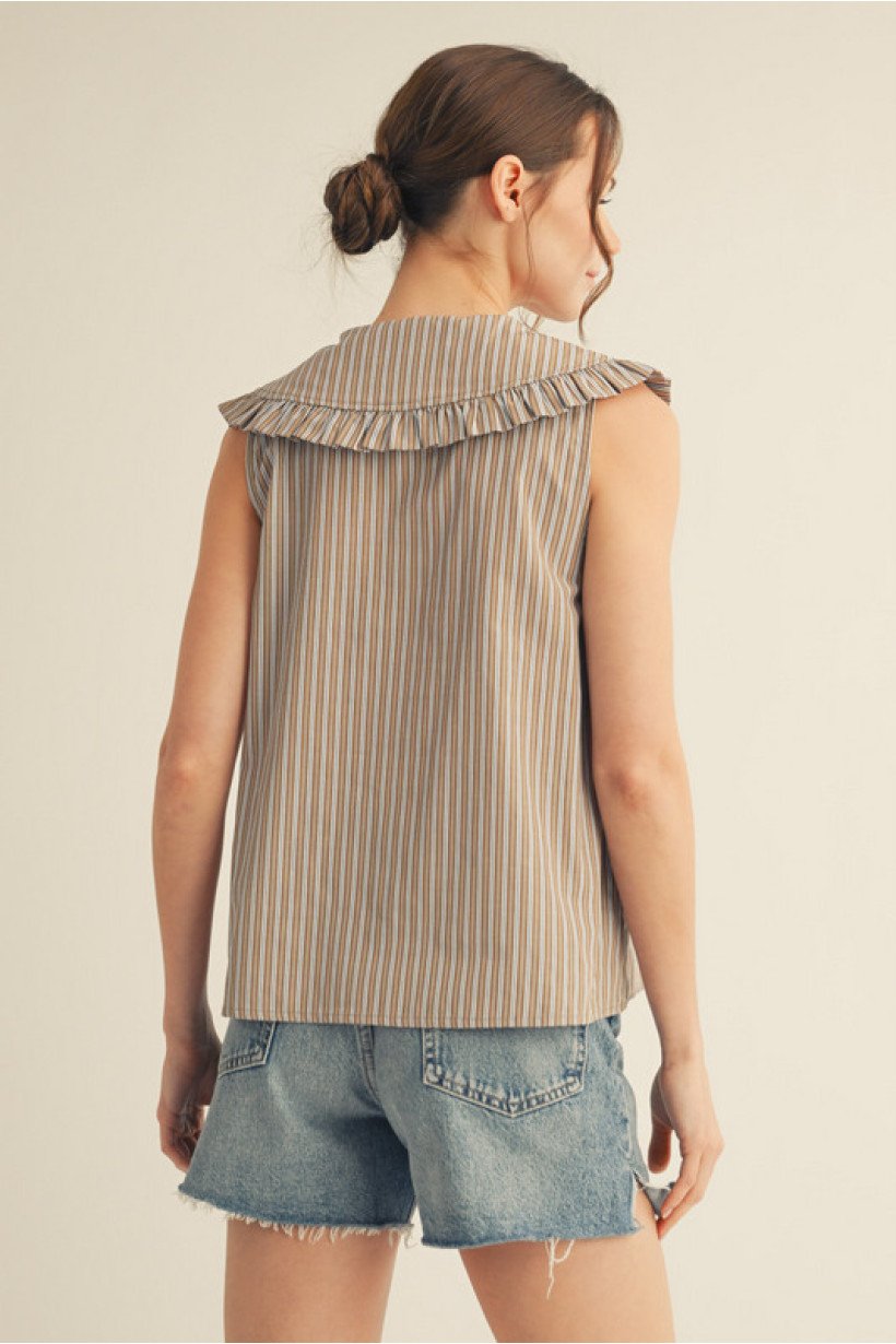 Stylish sleeveless striped top with a wide ruffled collar, perfect for beach wear or casual outings. Coastal boutique clothing.