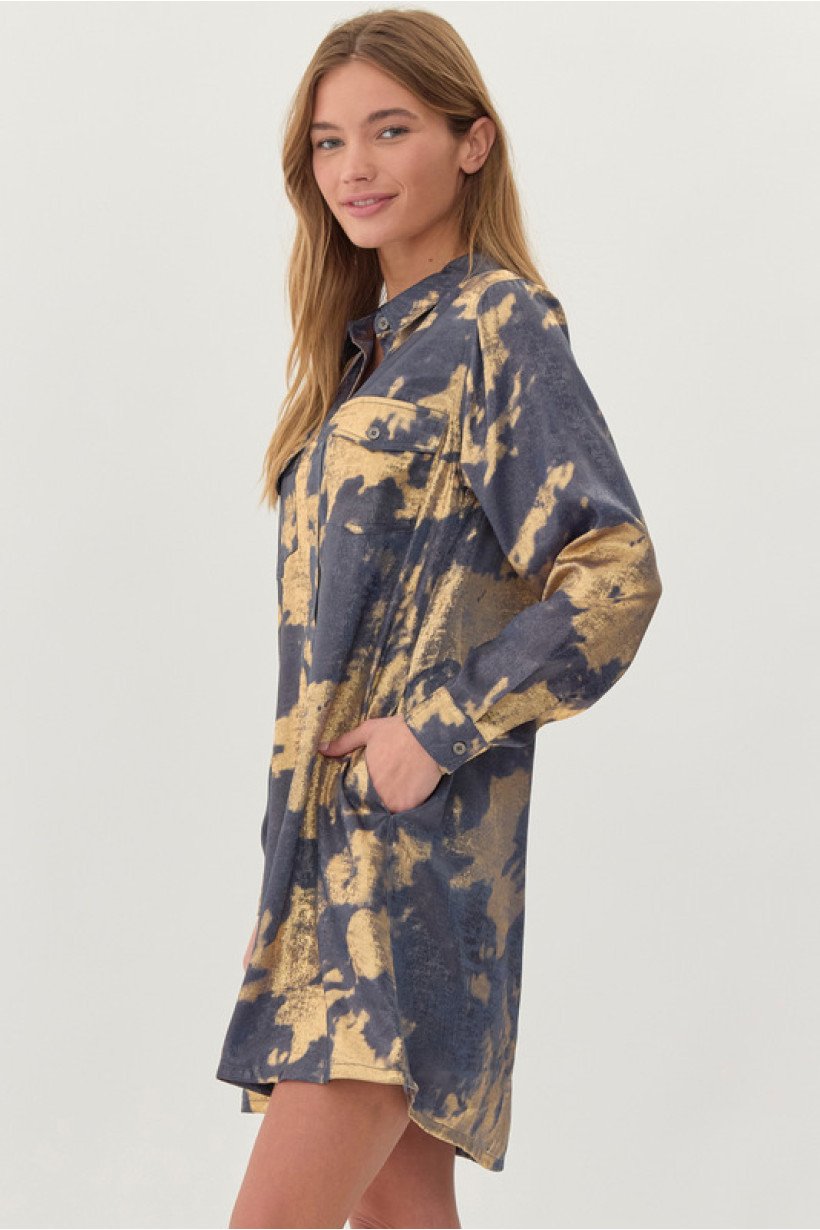 Denim and gold beach dress from coastal boutique clothing, perfect for tropical vacations and stylish women's fashion.