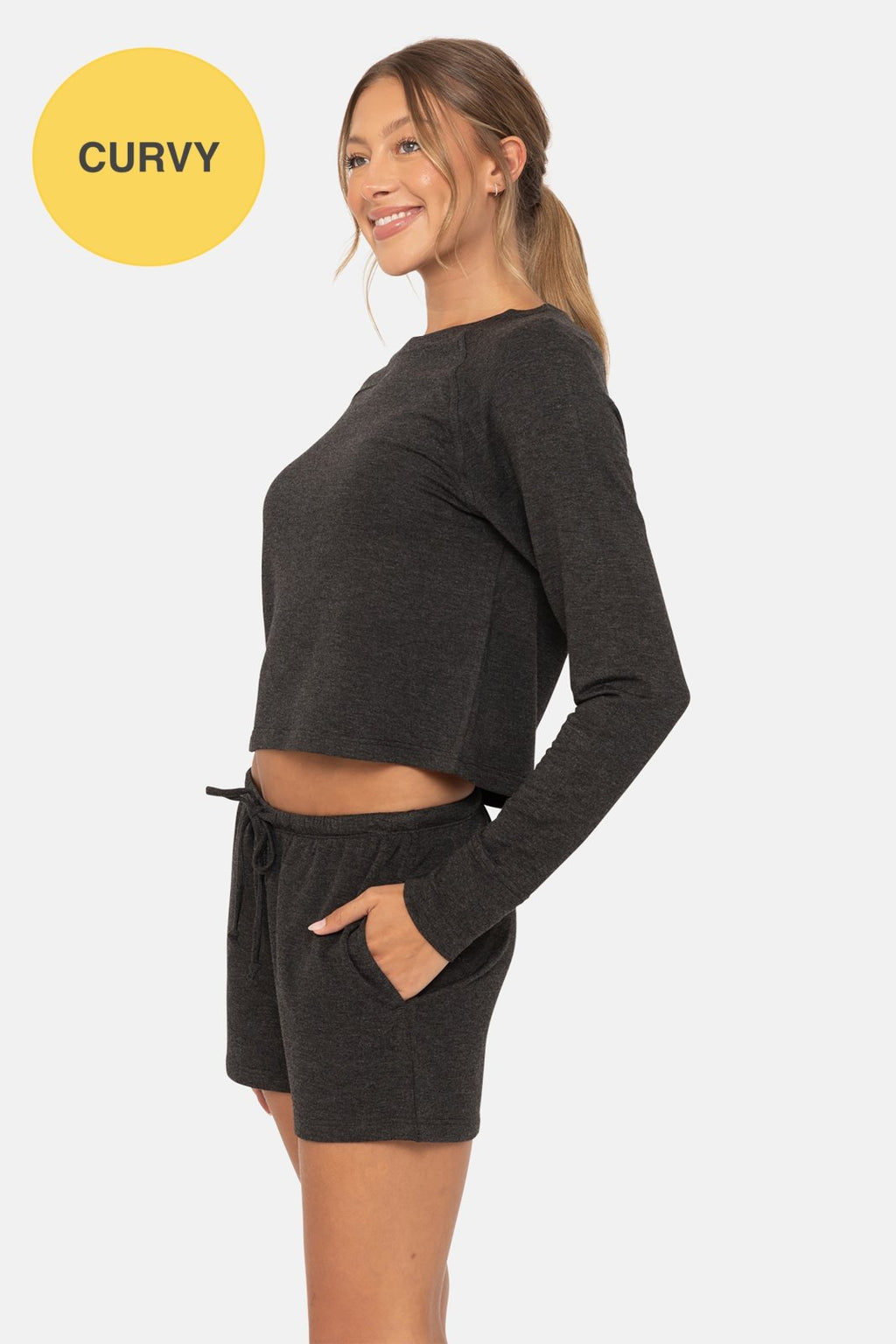 Curvy model showcases MB Raglan Lounge LS Top & Short Set, ideal for coastal boutique clothing and stylish women's fashion.