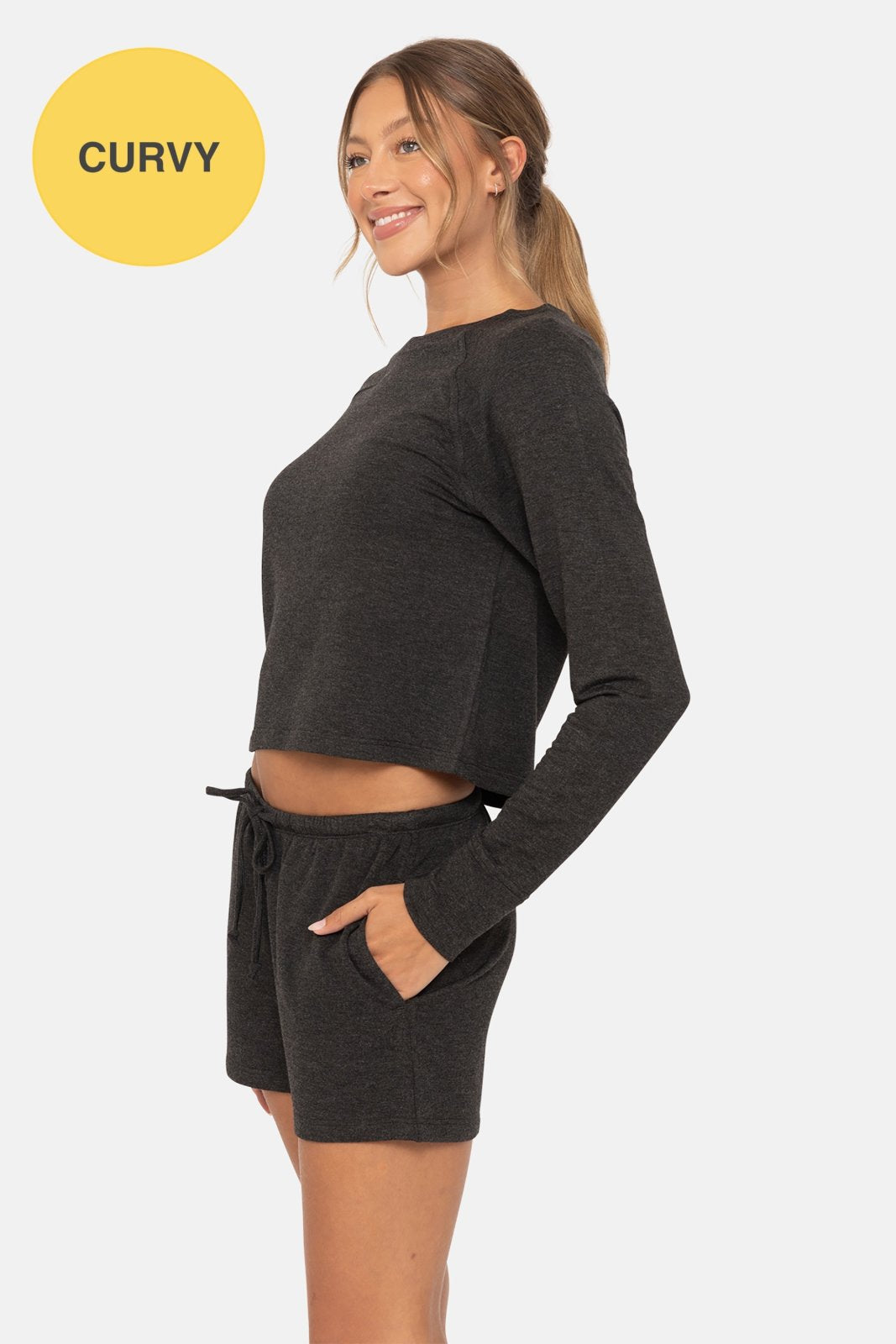 Curvy model showcases MB Raglan Lounge LS Top & Short Set, ideal for coastal boutique clothing and stylish women's fashion.