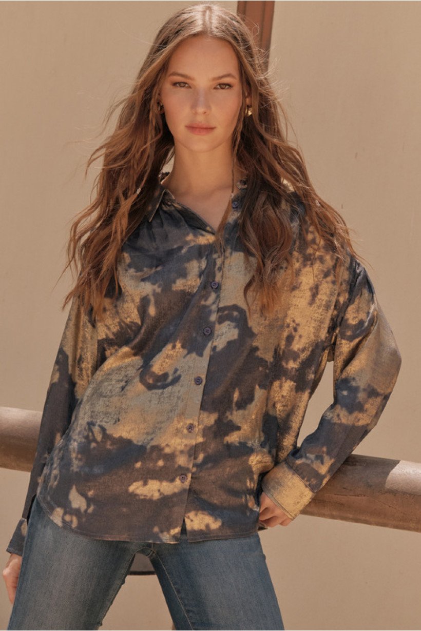 Stylish denim top featuring gold foil accents, perfect for coastal boutique clothing and fashionable gift cards.