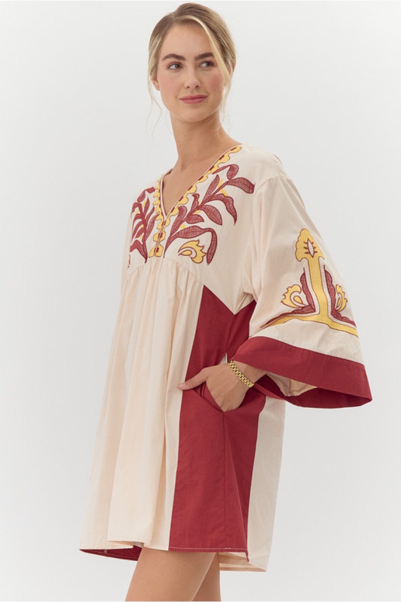Talia Dress, a chic cotton beach dress, perfect for tropical vacations. Available at a coastal boutique in Port Aransas.