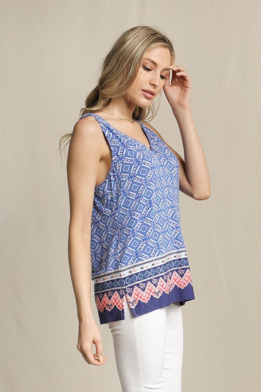 Printed V Neck Knit Top With Back Lattice modeled at Raggdoll Boutique, perfect for trendy coastal style in Port Aransas.