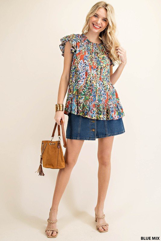 BLUE MIX RUFLE SLEEVE TOP styled with denim skirt and handbag from Raggdoll Boutique, perfect for coastal fashion.