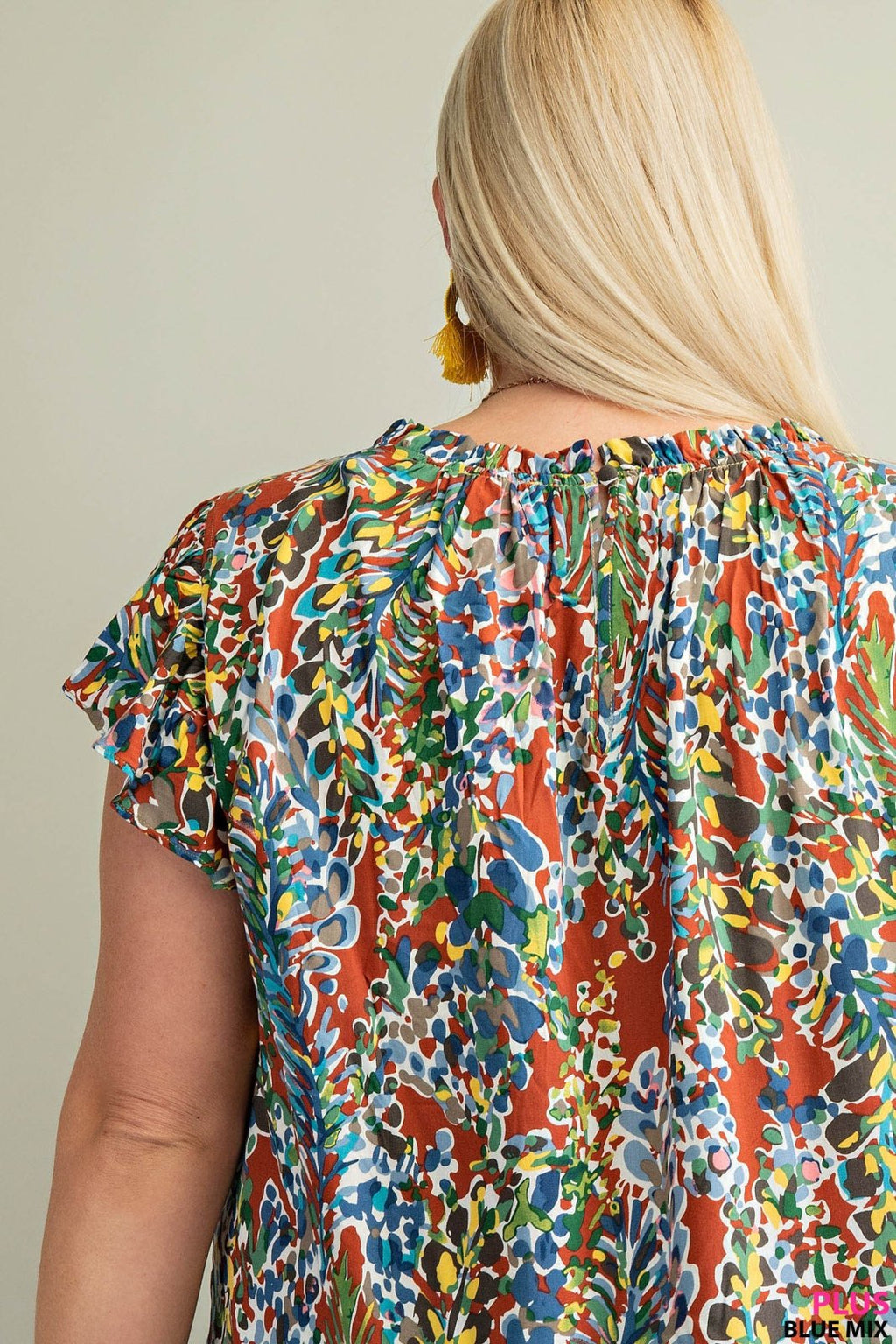 PLUS BLUE MIX PRINT TOP showcasing vibrant floral patterns, perfect for trendy coastal style and summer outfits Texas.