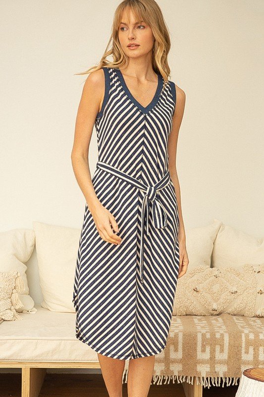 SHOW ME YOUR STRIPES DRESS featuring deep V neck, waist tie, and side pockets. Ideal for coastal boutique clothing and tropical vacations.