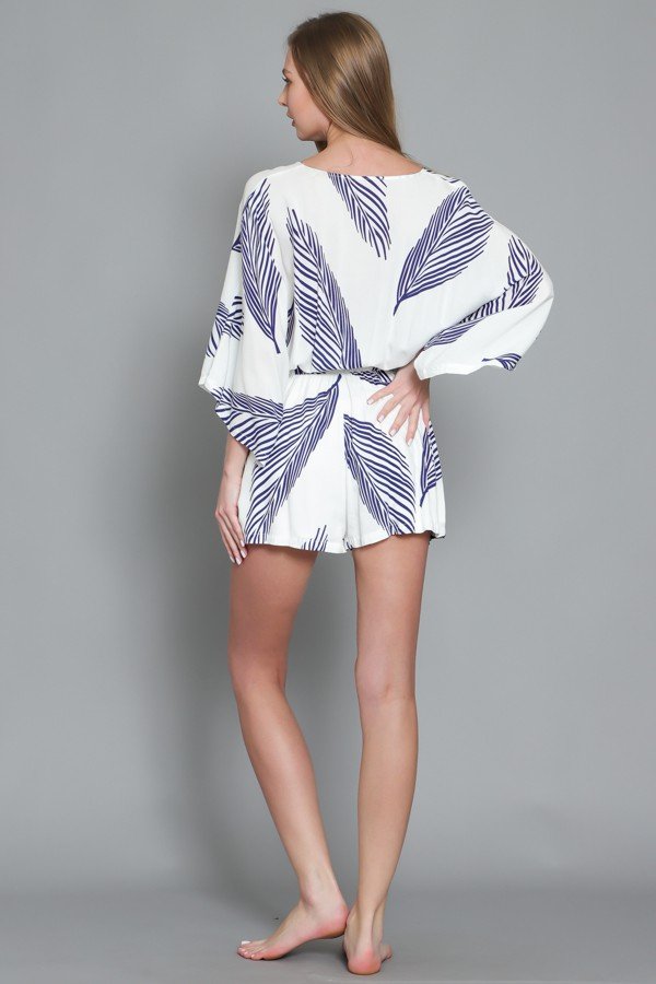 KIMONA STYLE BLUE AND NAVY ROMPER from Raggdoll Boutique showcasing trendy coastal style in Port Aransas.