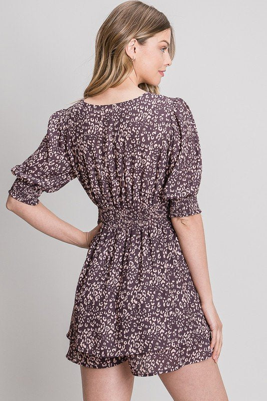 Back view of the COCO AND PEACH ROMPER showcasing trendy coastal style from Raggdoll Boutique.