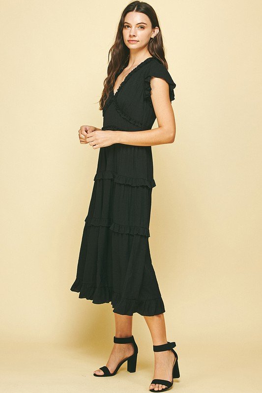 BLACK RUFFLED TEA LENGTH dress by Raggdoll Boutique, perfect for summer outfits Texas and trendy coastal style.