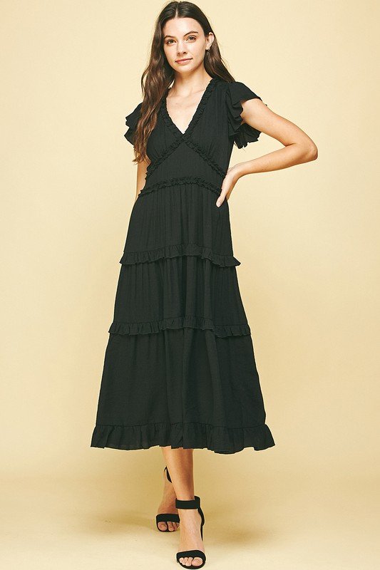 BLACK RUFFLED TEA LENGTH dress from Raggdoll Boutique, perfect for trendy coastal style and summer outfits Texas.