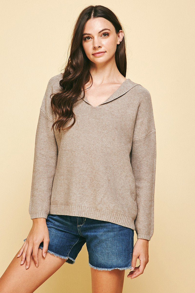 Soft oatmeal sweater with hood styled with denim shorts from Raggdoll Boutique, perfect for trendy coastal style.