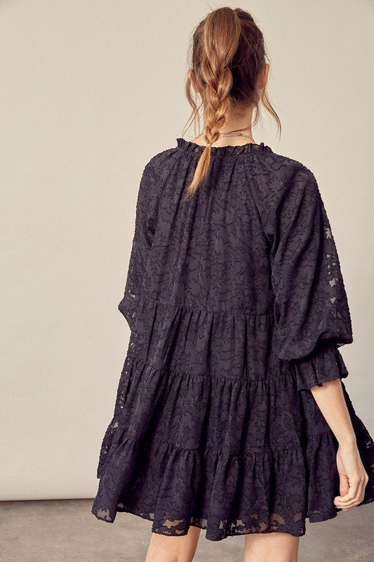 Back view of BLACK FLORAL BABY DOLL dress, perfect for summer outfits Texas from Raggdoll Boutique.