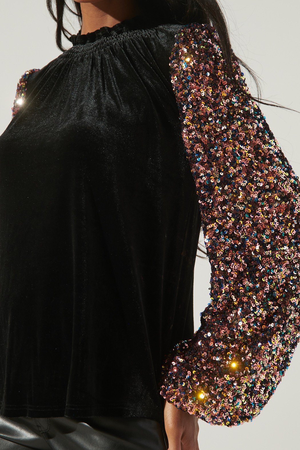 Black Velvet top with Sequin Detail Sleeves from Raggdoll Boutique, perfect for trendy coastal style.