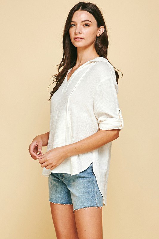 White Hooded Casual Top from Raggdoll Boutique, perfect for summer outfits Texas and trendy coastal style.