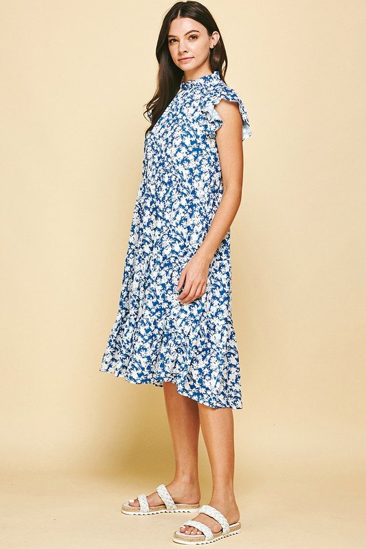 Model wearing BLOOMED TO PERFECTION DRESS from Raggdoll Boutique, perfect for summer outfits Texas.