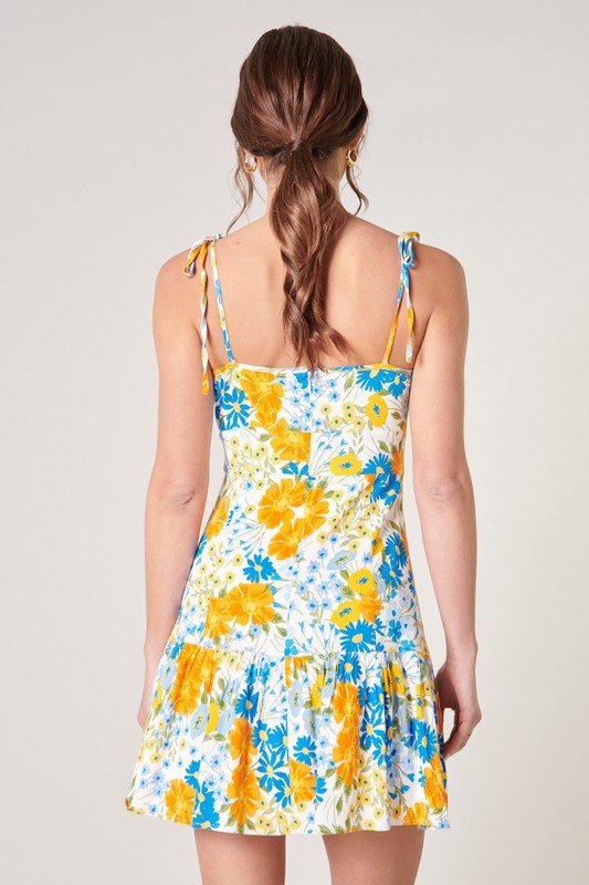 CABANA TIE-STRAP DRESS in colorful floral pattern, perfect for trendy coastal style summer outfits Texas.