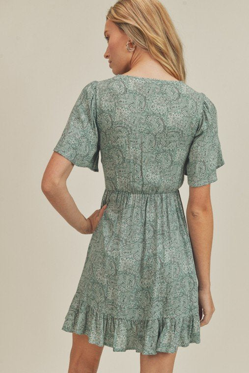 Back view of SPRING GREEN PAISELY TIE FRONT DRESS from Raggdoll Boutique, perfect for summer outfits Texas.