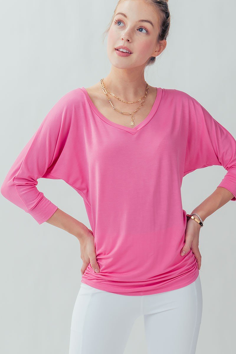 PINK MODAL RUCHED TUNIC TOP displayed with batwing sleeves, perfect for trendy coastal style at Raggdoll Boutique.