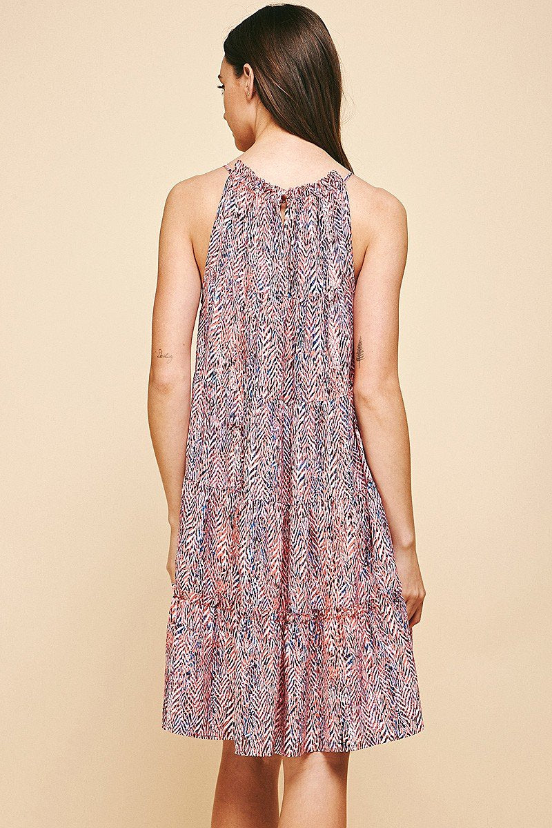 ABSTRACT NAVY AND PINK DRESS from Raggdoll Boutique showcasing a trendy coastal style for summer outfits in Texas.