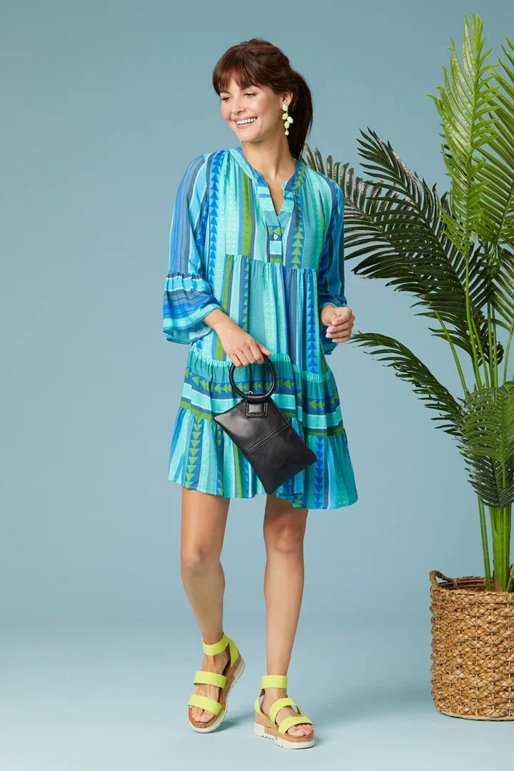 COCO + CARMEN Milena Ruffle Sleeve Tunic Dress, vibrant beach dress perfect for coastal boutique clothing styles.